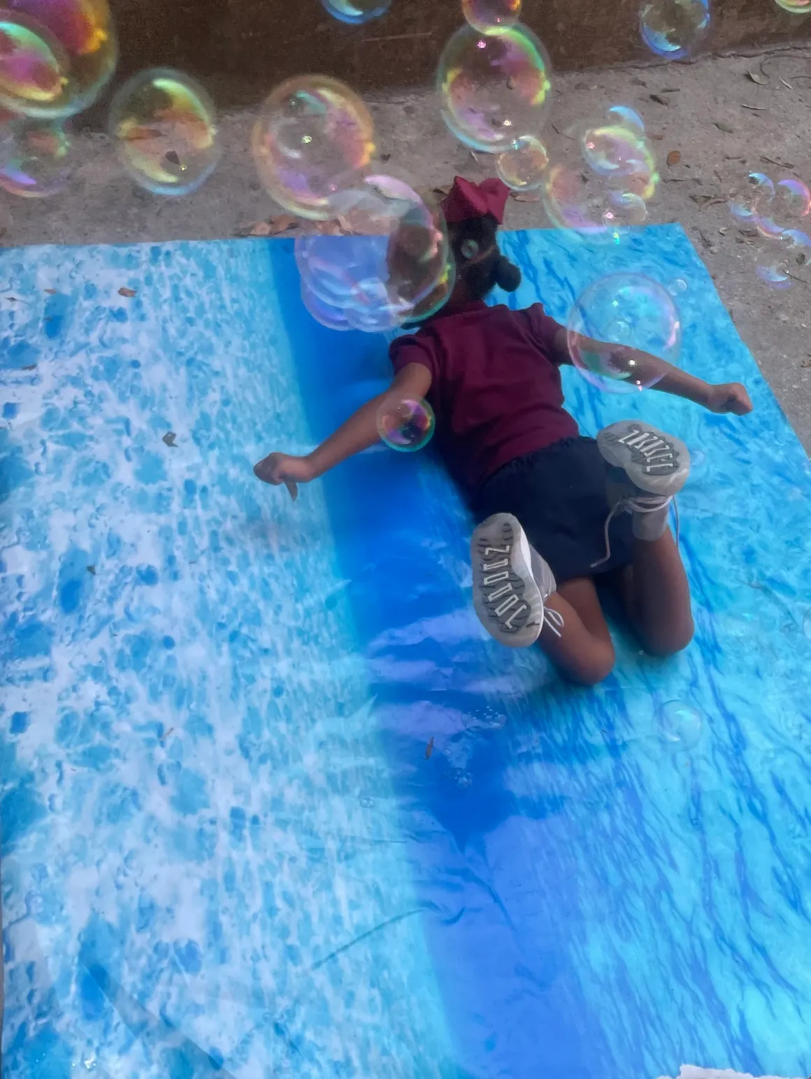 A person on a skateboard in the water.